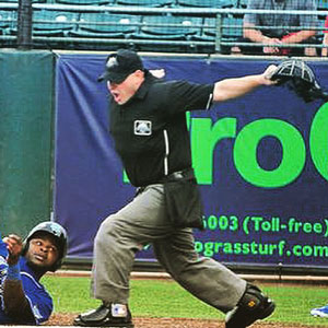 Josh Mann Umpiring Calling Runner Safe